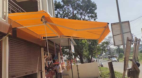 Premium fixed awning installed over a shop entrance