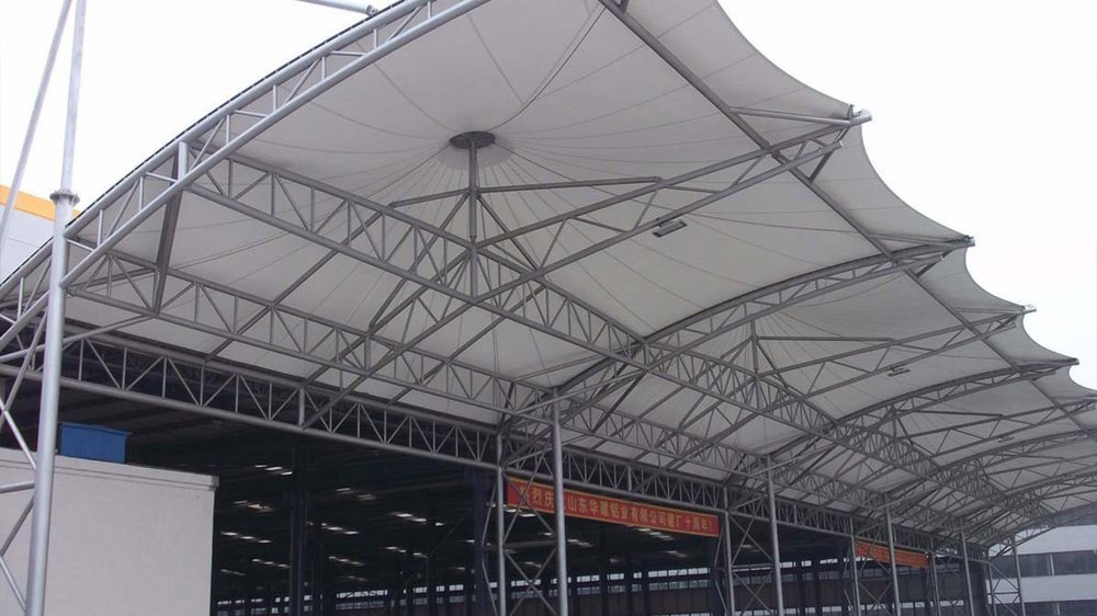 Large architectural tensile membrane structure with steel framework